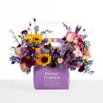 باکس گل بنفش پاکتی با گل آفتابگردان زیباست.