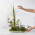 خرید آنلاین سبد گل حصیری با گل ارکیده