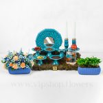 سبد گل هفت سین فیروزه ای از نمای دور